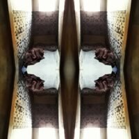mirror photo image of hijacked building in Johannesburg