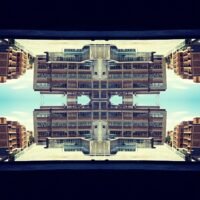 mirror photo image of hijacked building in Johannesburg